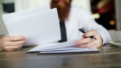 reading business papers scaled